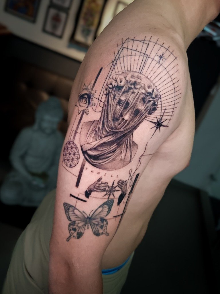 Tatuaje conceptual de busto de estatua con velo y estrellas en el brazo